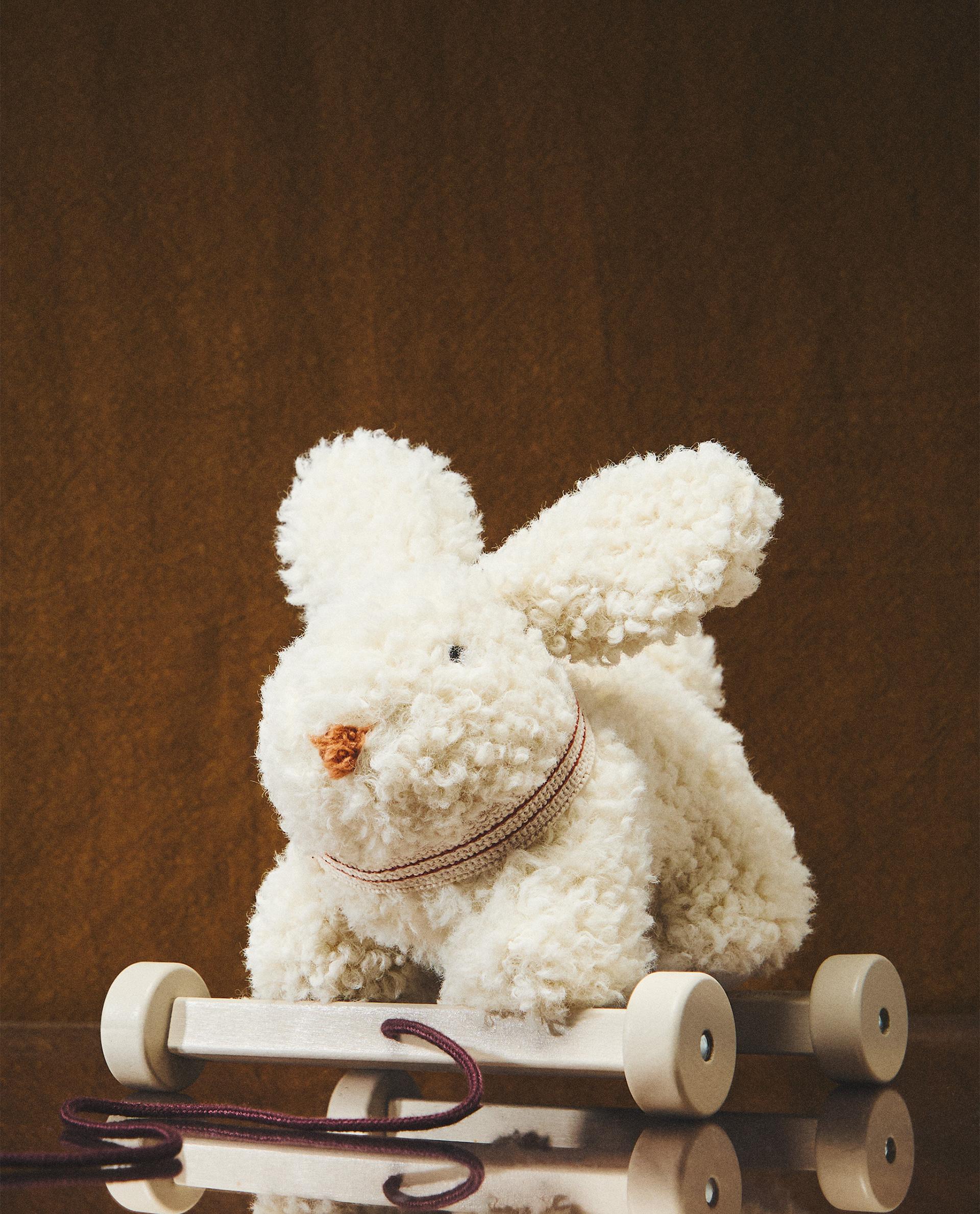 CHILDREN'S SOFT TOY RABBIT WITH WHEELS