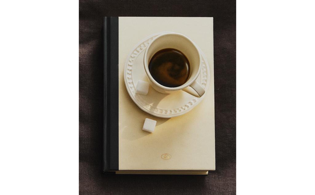 RAISED STONEWARE COFFEE CUP AND SAUCER RAISED STONEWARE COFFEE CUP AND SAUCER