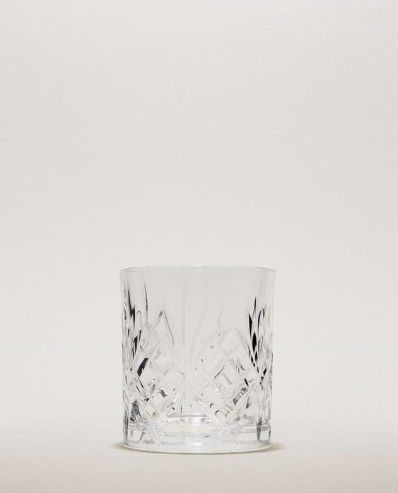 CRYSTALLINE TUMBLER WITH RAISED DESIGN