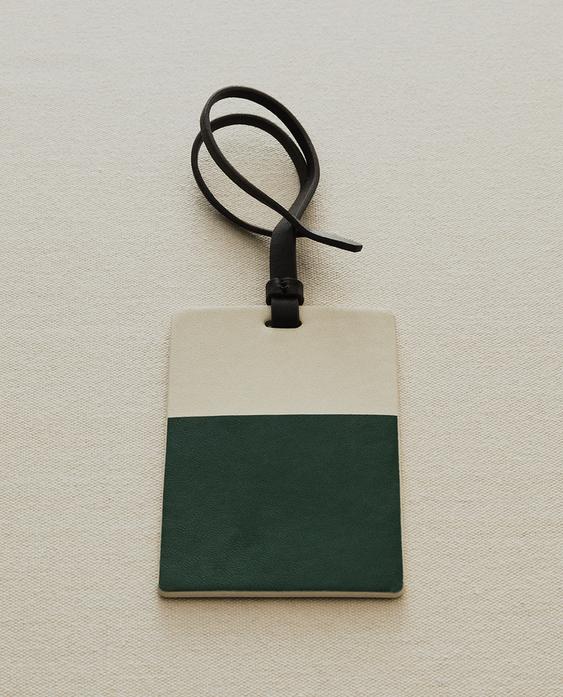 ÉTIQUETTE BAGAGE CUIR