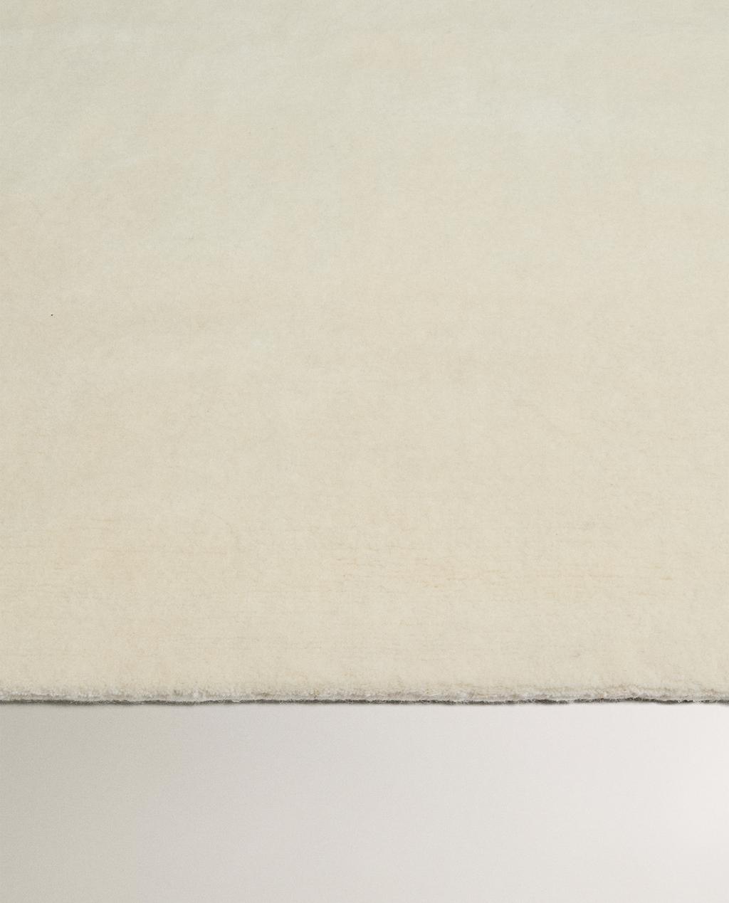 HAND-KNOTTED WOOL RUG