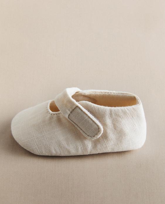 GEWIRKTER BALLERINA-HAUSSCHUH GEWIRKTER BALLERINA-HAUSSCHUH