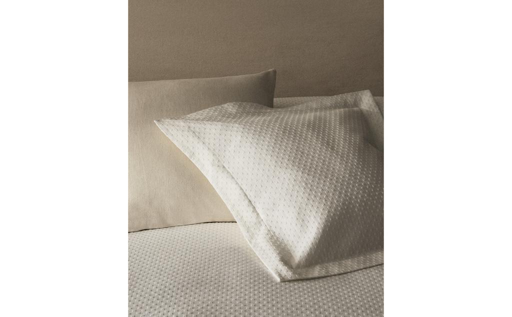 FUNDA DE COIXÍ AMB DISSENY DE PUNTS