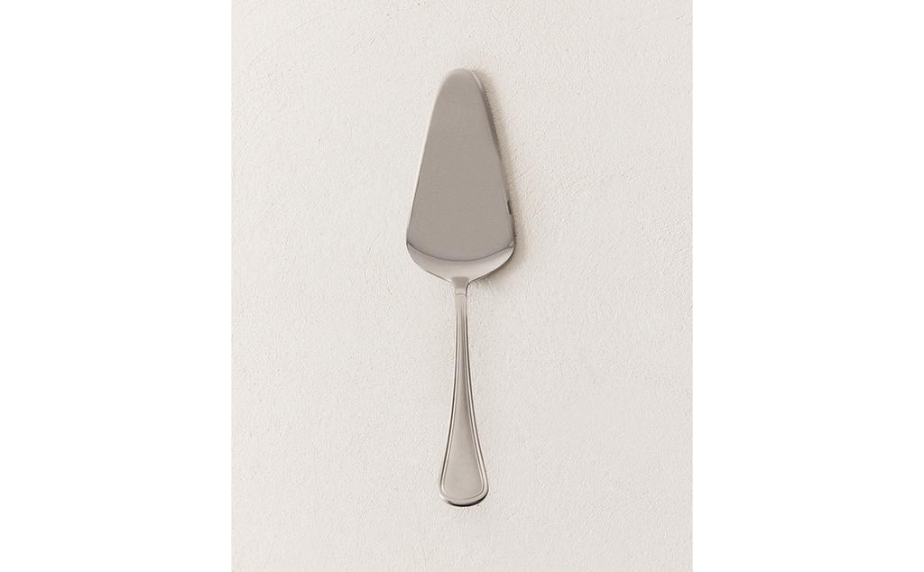 KUCHENHEBER AUS GLÄNZENDEM STAHL KUCHENHEBER AUS GLÄNZENDEM STAHL