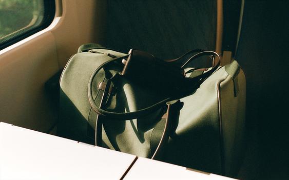 COTTON AND LEATHER TRAVEL BAG