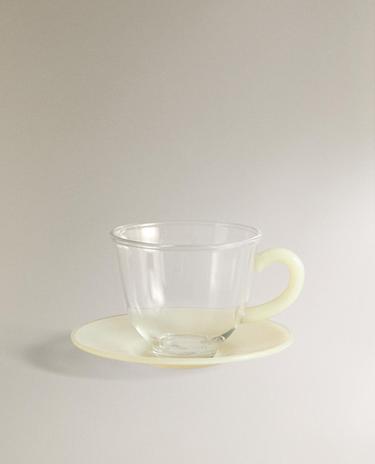 فنجان قهوة من زجاج البورسليكات الملون وطبق