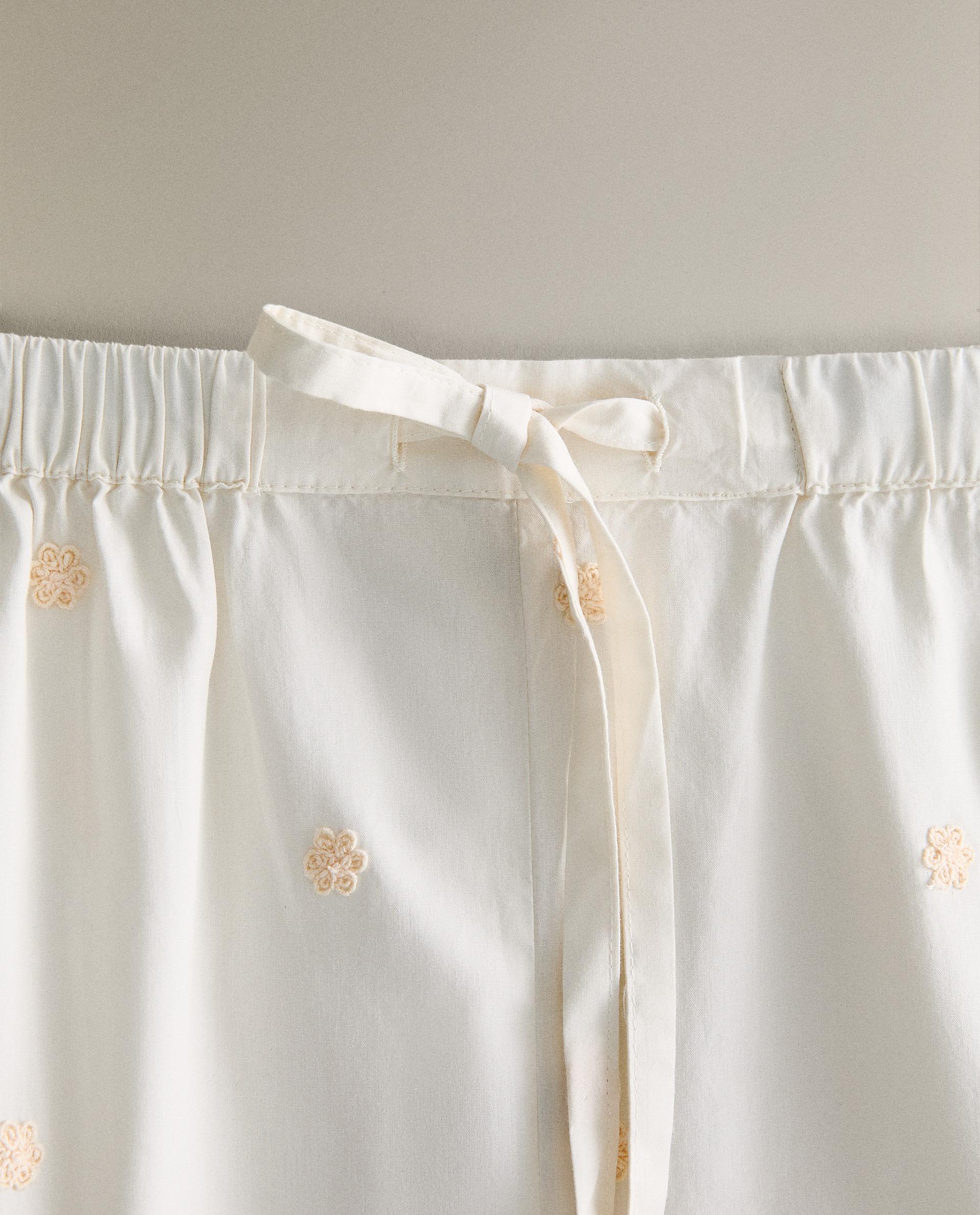 COTTON TROUSERS WITH FLORAL EMBROIDERY