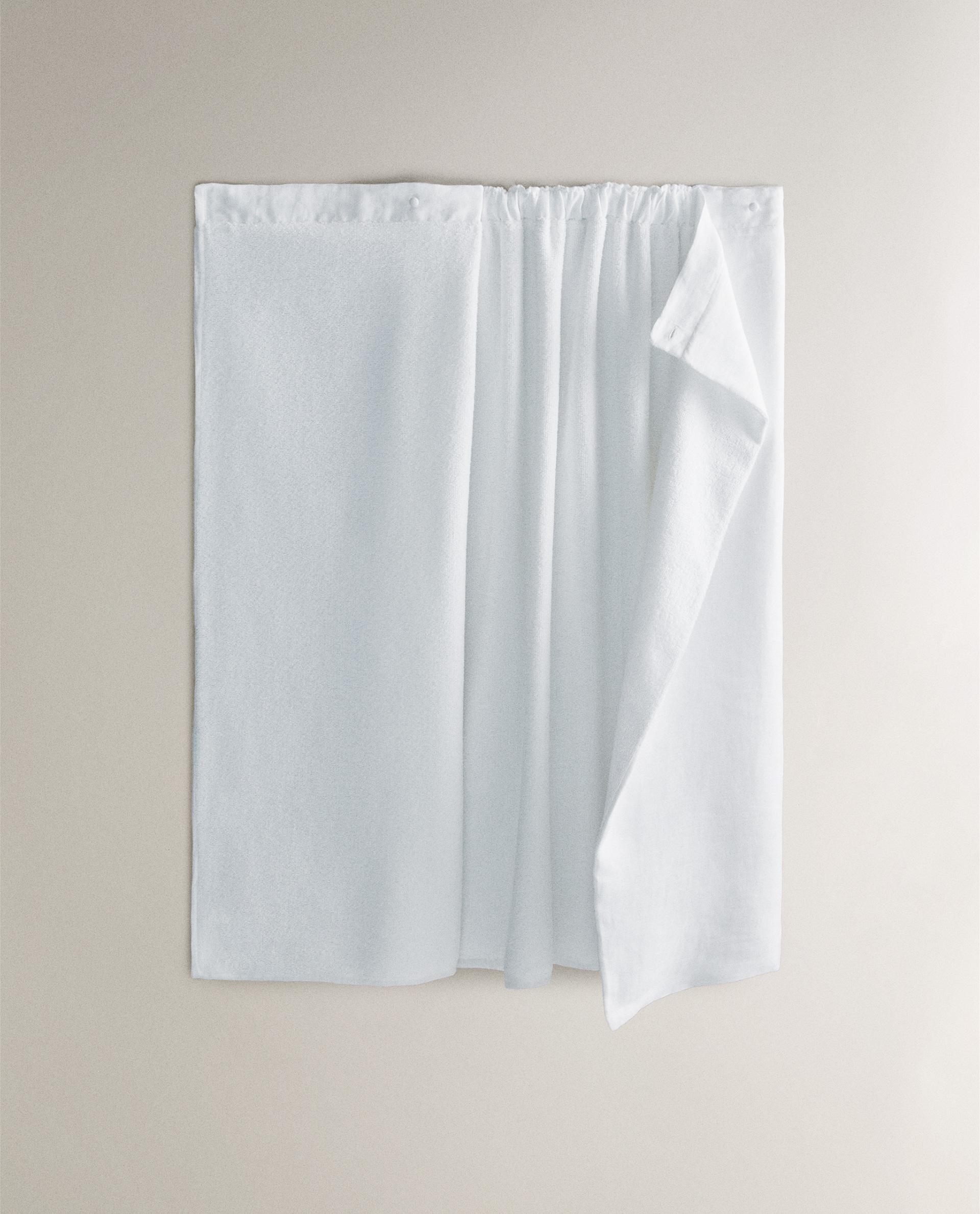 WRAP-AROUND BODY TOWEL WITH BUTTONS