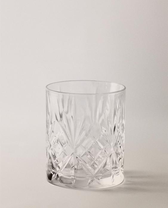 CRYSTALLINE TUMBLER WITH RAISED DESIGN