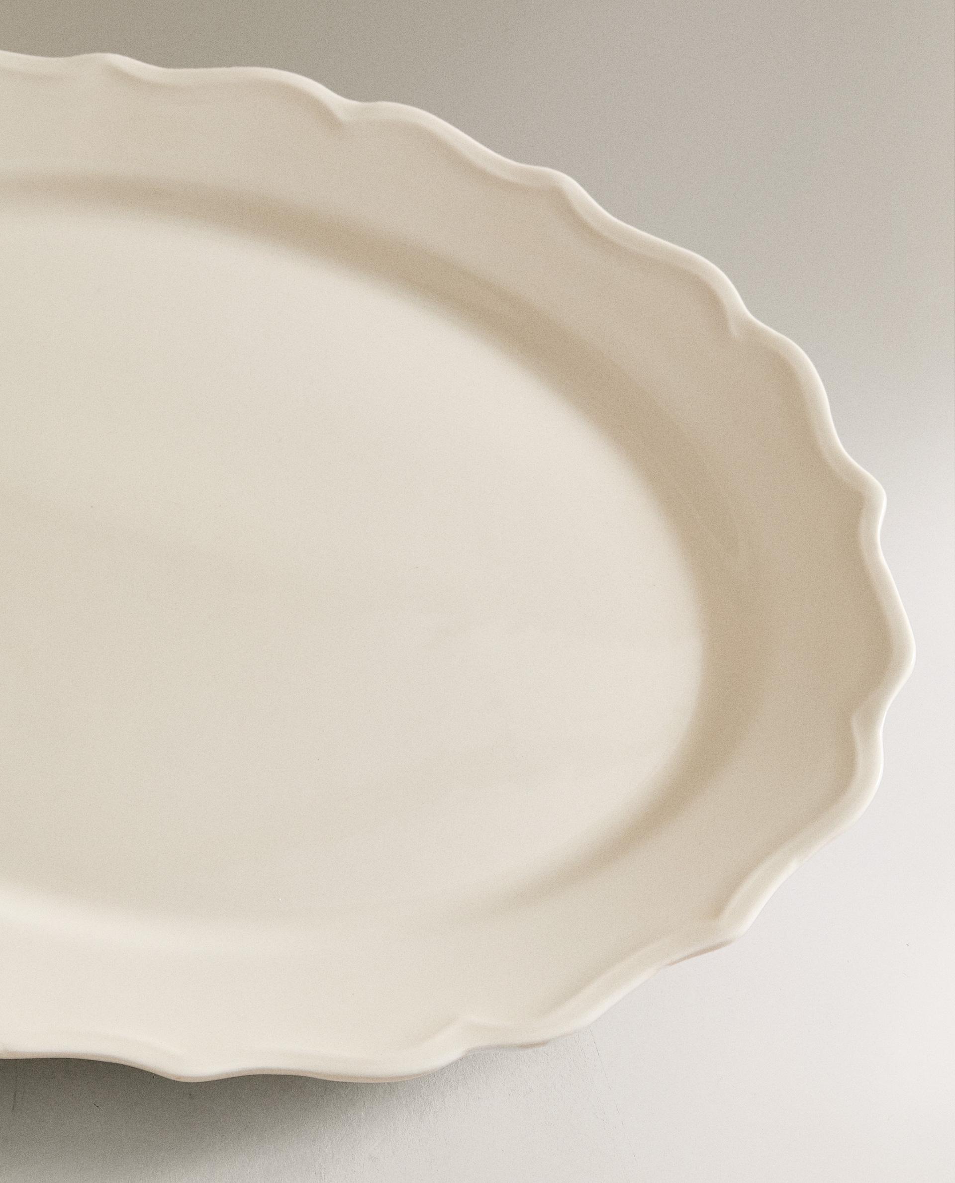 EARTHENWARE SERVING DISH WITH RAISED-DESIGN EDGE