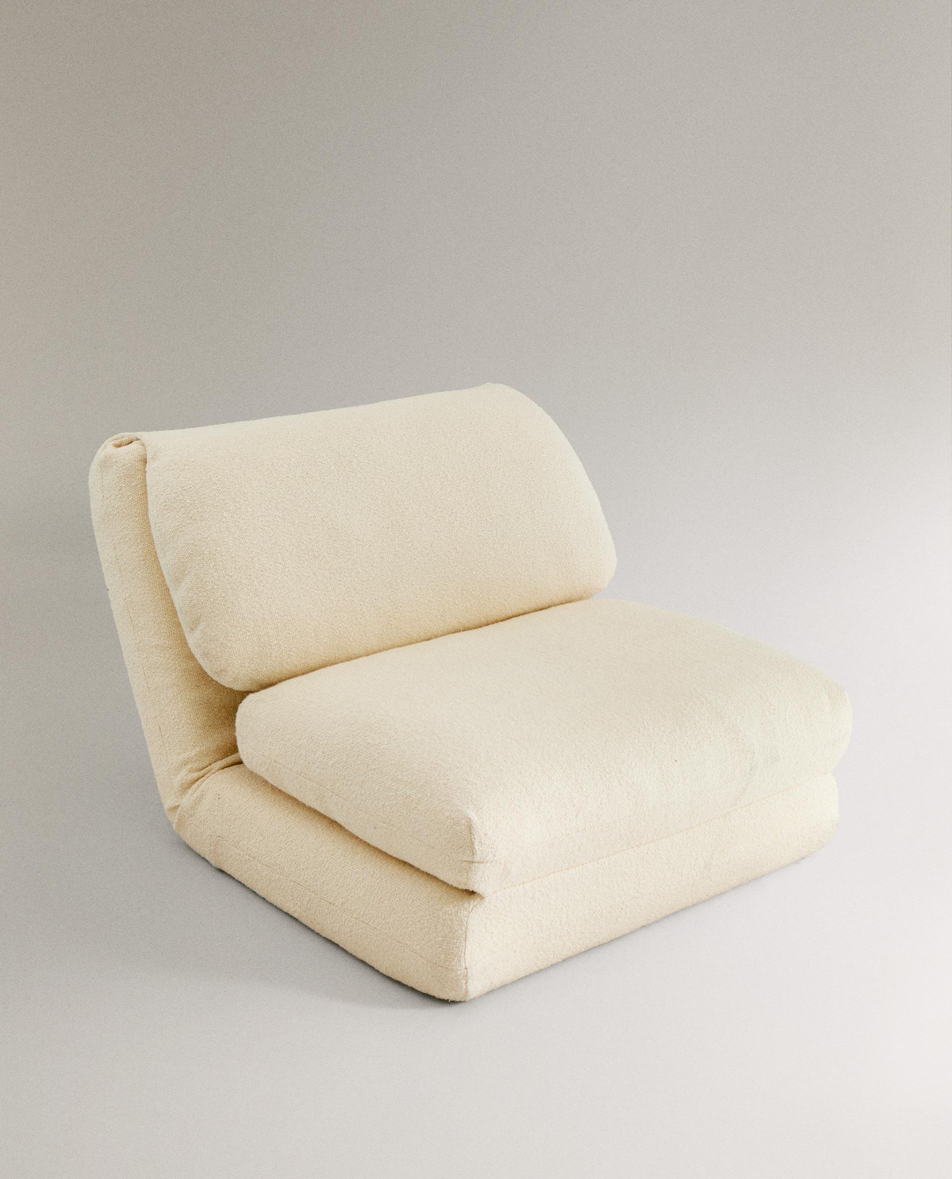 FOLDING BOUCLÉ ARMCHAIR