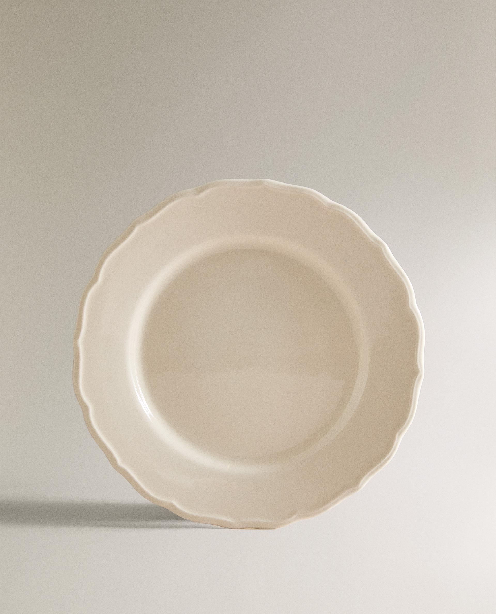 EARTHENWARE DINNER DISH WITH RAISED-DESIGN EDGE