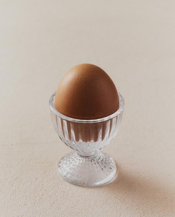 GLASS EGG CUP WITH RAISED GEOMETRIC DESIGN
