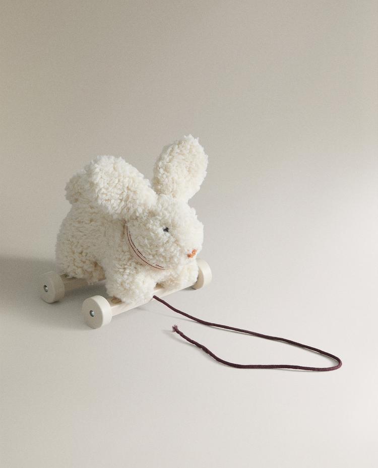 CHILDREN'S SOFT TOY RABBIT WITH WHEELS