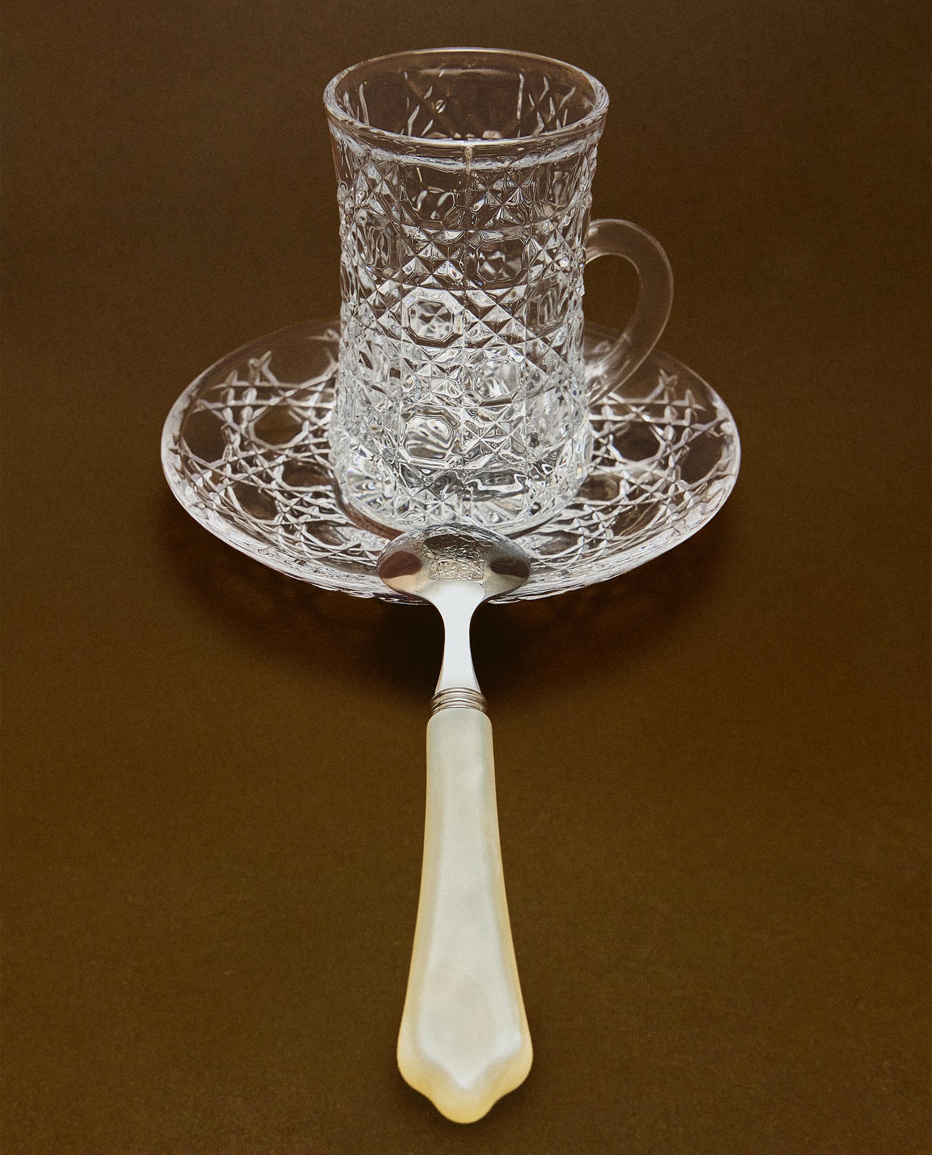 RAISED DESIGN GLASS MUG AND SAUCER