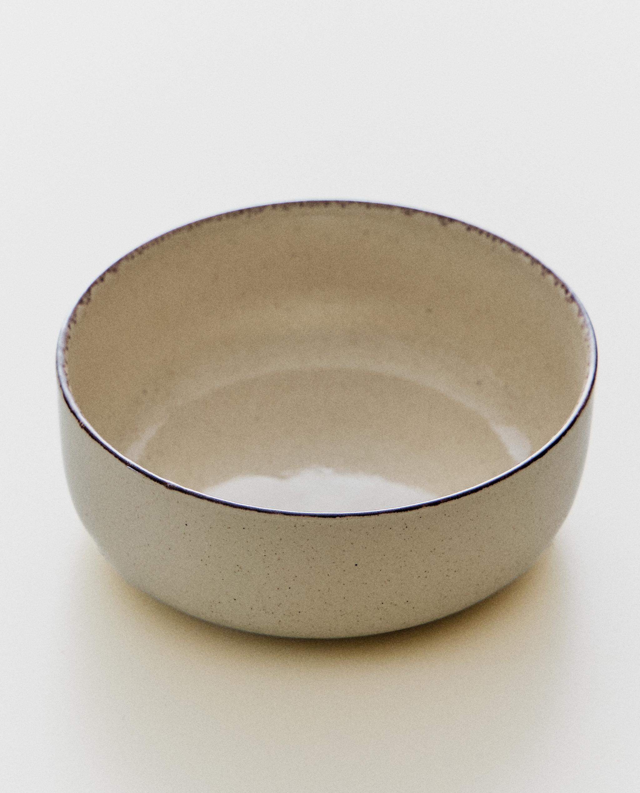 STONEWARE BOWL WITH ANTIQUE FINISH RIM