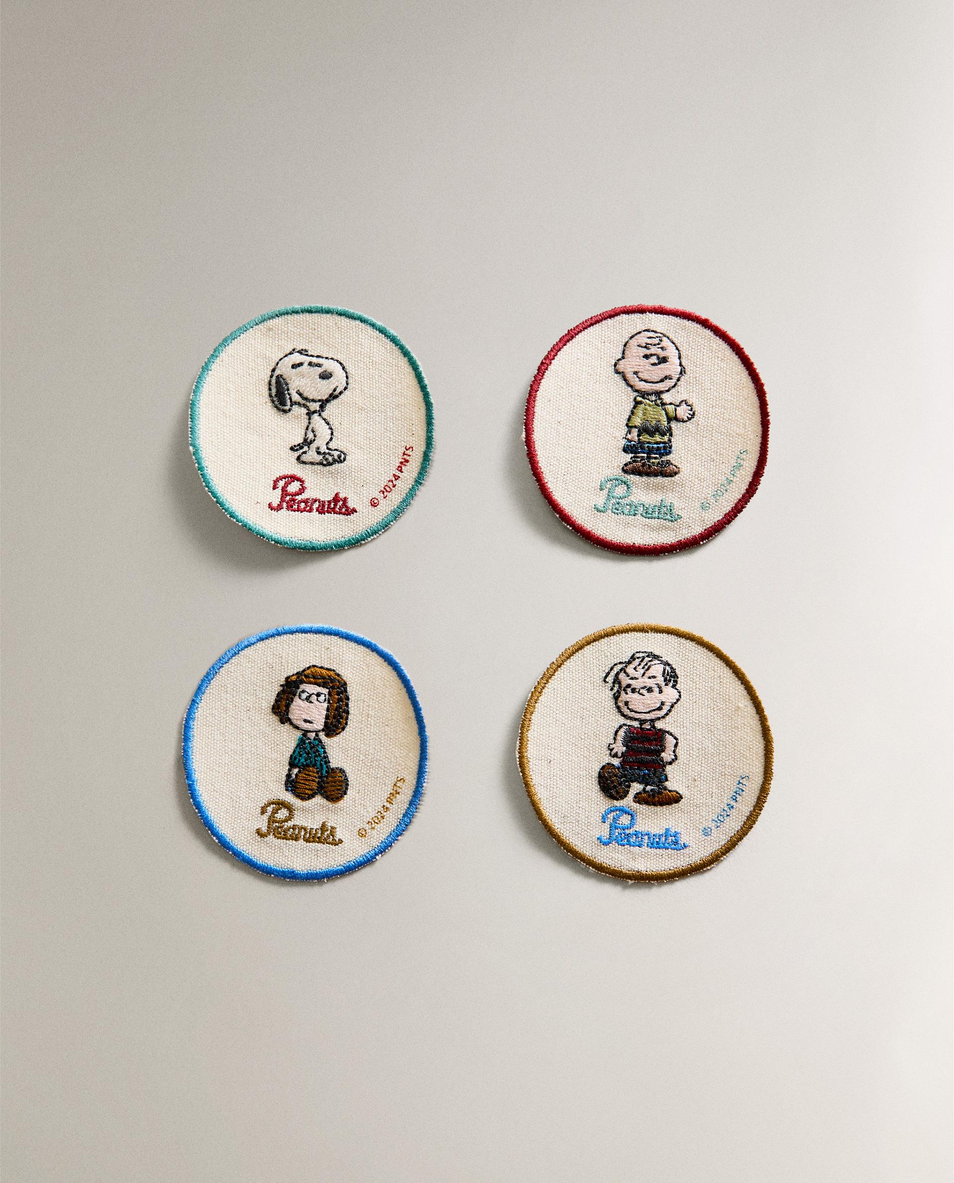 LOT ÉTIQUETTES ENFANT PEANUTS™ (LOT DE 4)