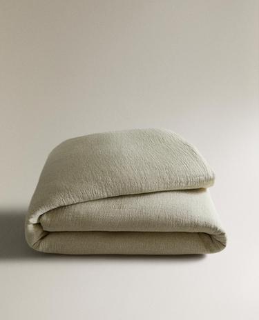 SENGETÆPPE MED TEKSTUR SENGETÆPPE MED TEKSTUR