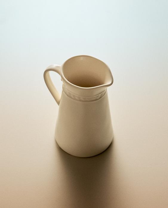 RAISED STONEWARE MILK JUG
