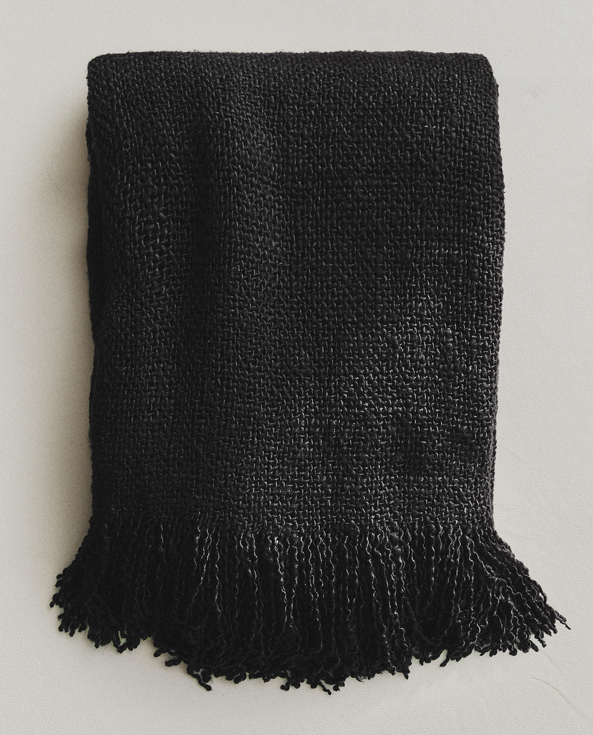 FRINGED THROW