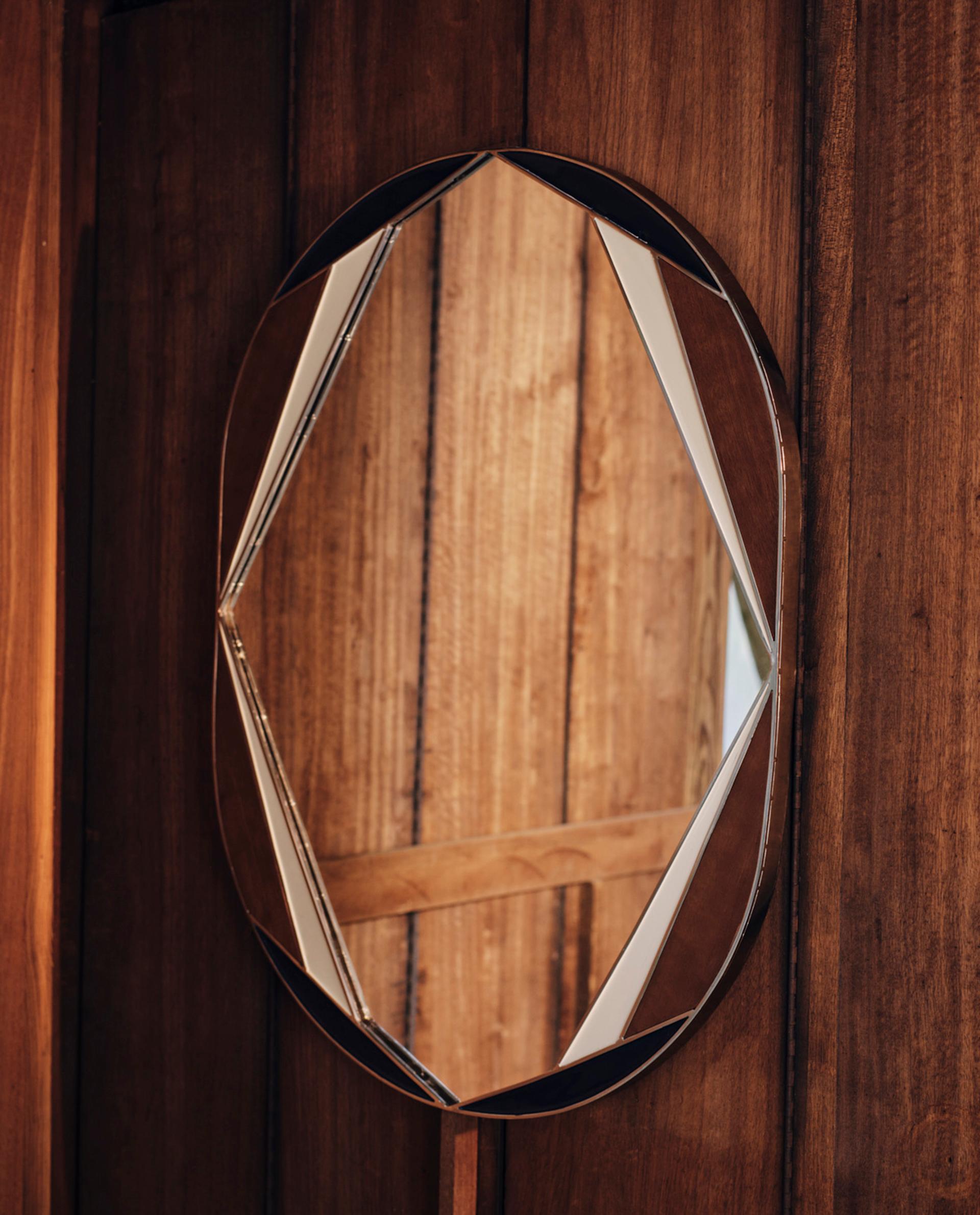 WALL MIRROR WITH IRREGULAR ENAMEL FRAME