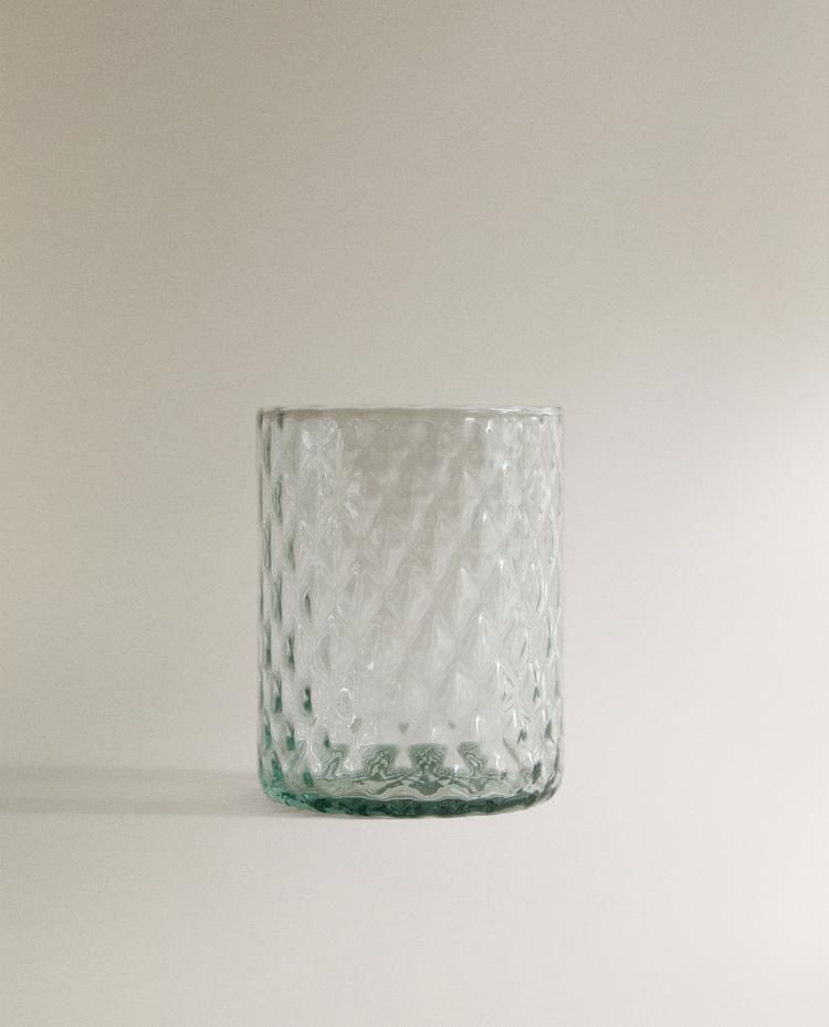 GLAS MET RELIËFMOTIEF