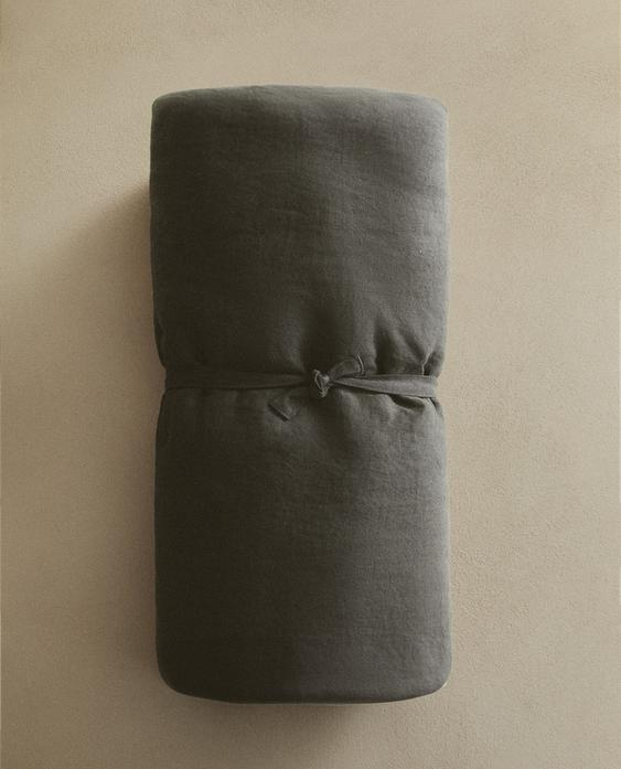 POLSTER IM USED-LOOK AUS LEINEN