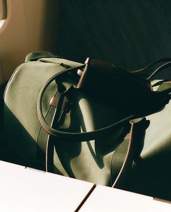 COTTON AND LEATHER TRAVEL BAG