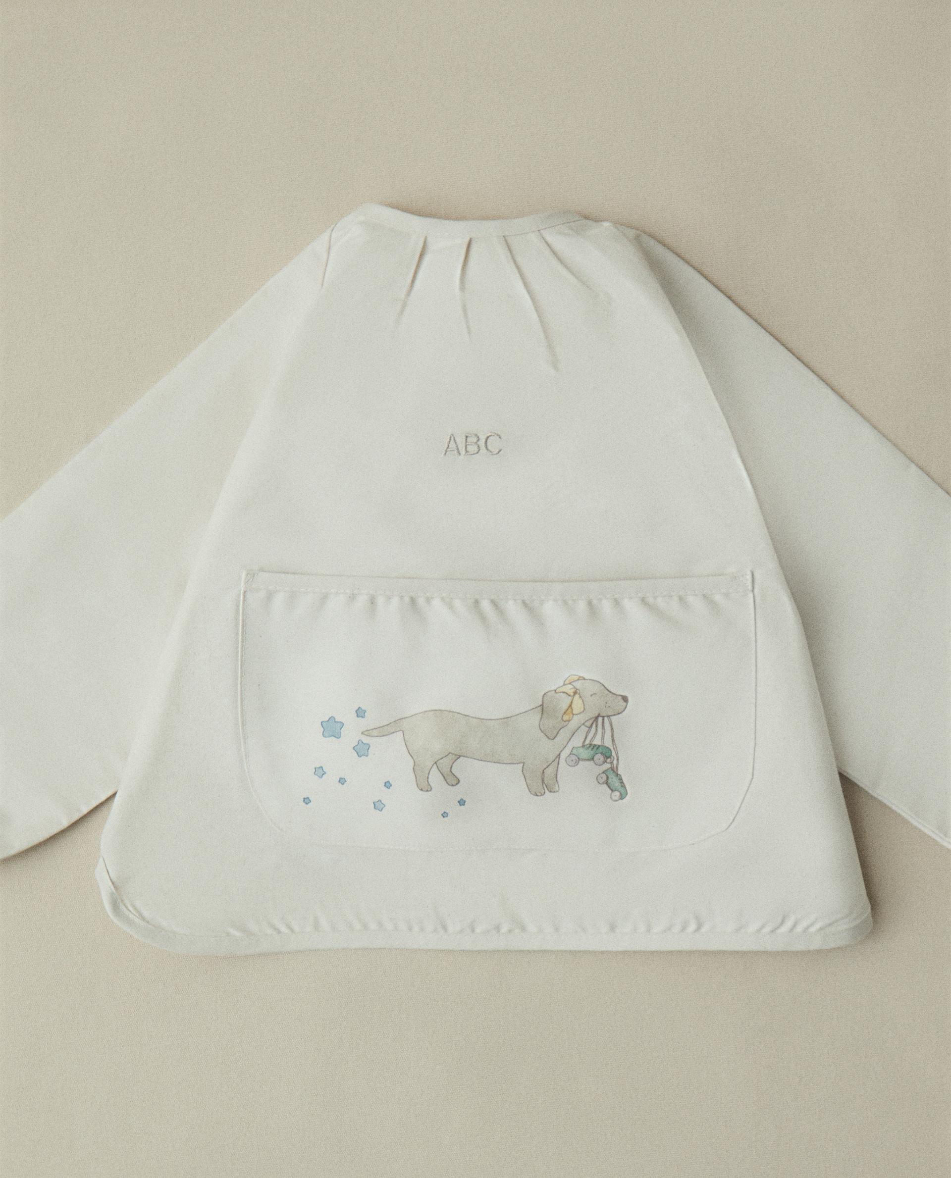 CHILDREN'S BIB WITH RACER DOG SLEEVES