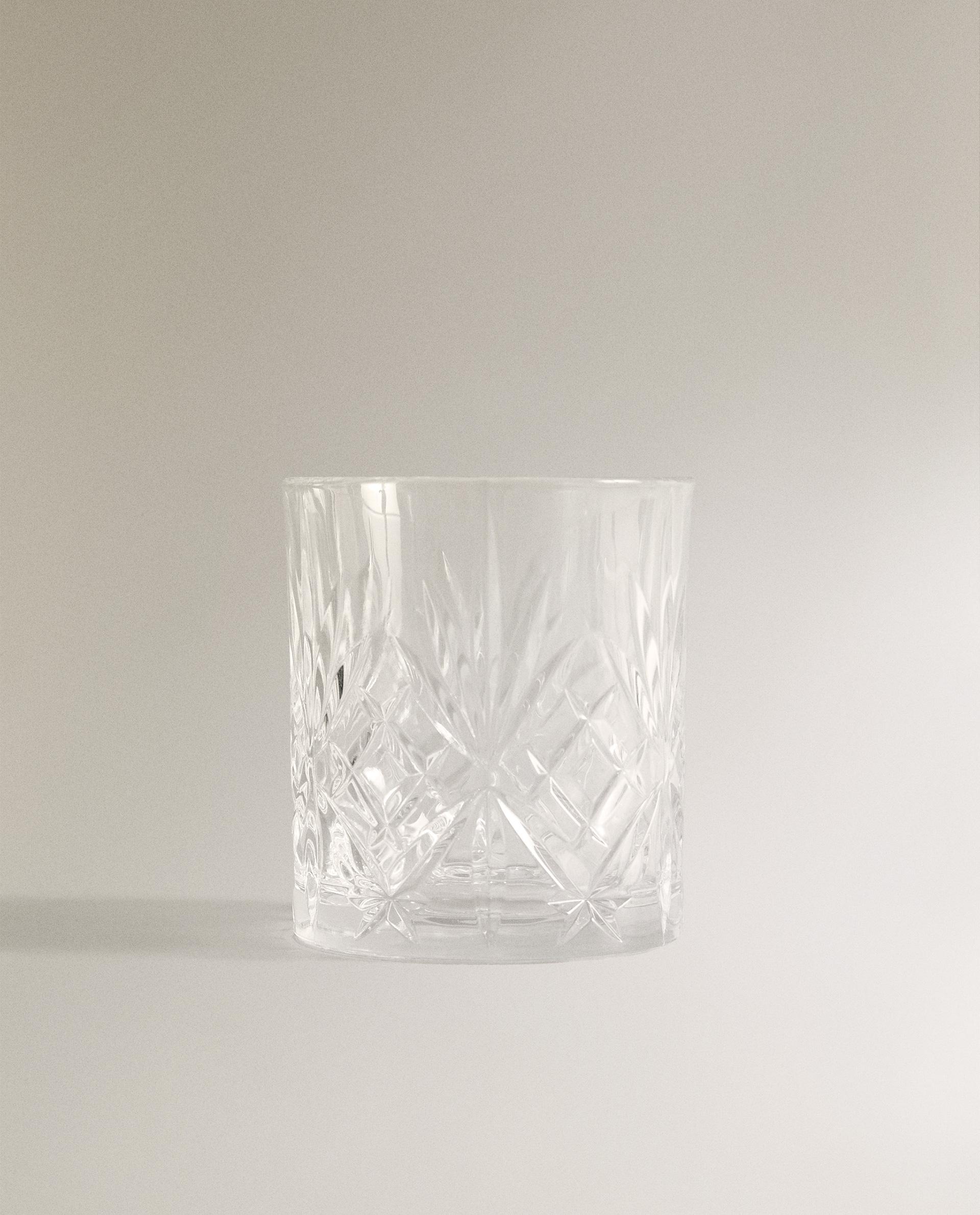 CRYSTALLINE TUMBLER WITH RAISED DESIGN