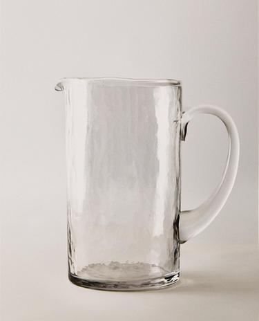 KRUG AUS GEHÄMMERTEM GLAS