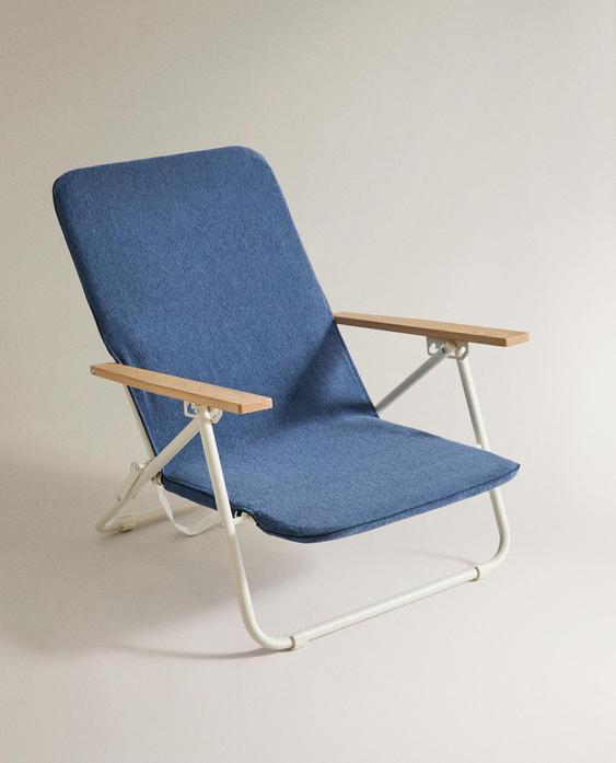 غلاف كرسي للشاطئ بمنظر منشفة