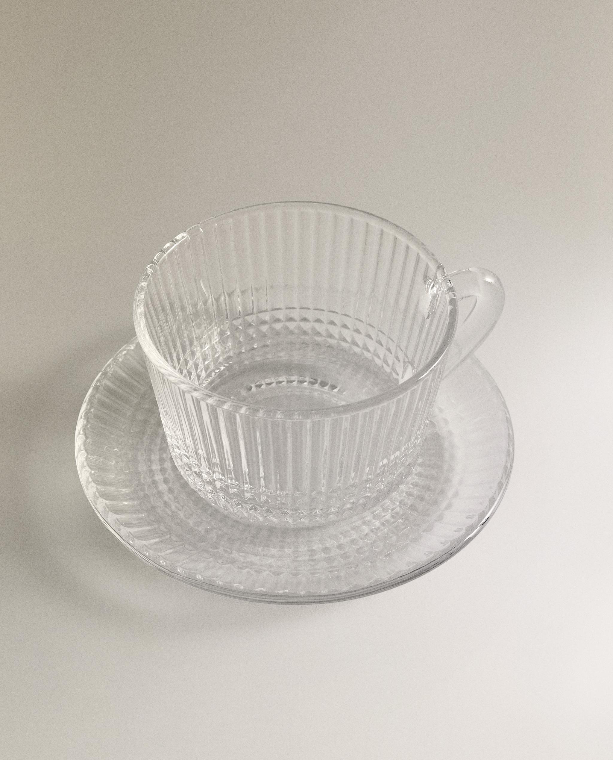 GLASS TEACUP AND SAUCER WITH RAISED GEOMETRIC DESIGN product thumbnail 2