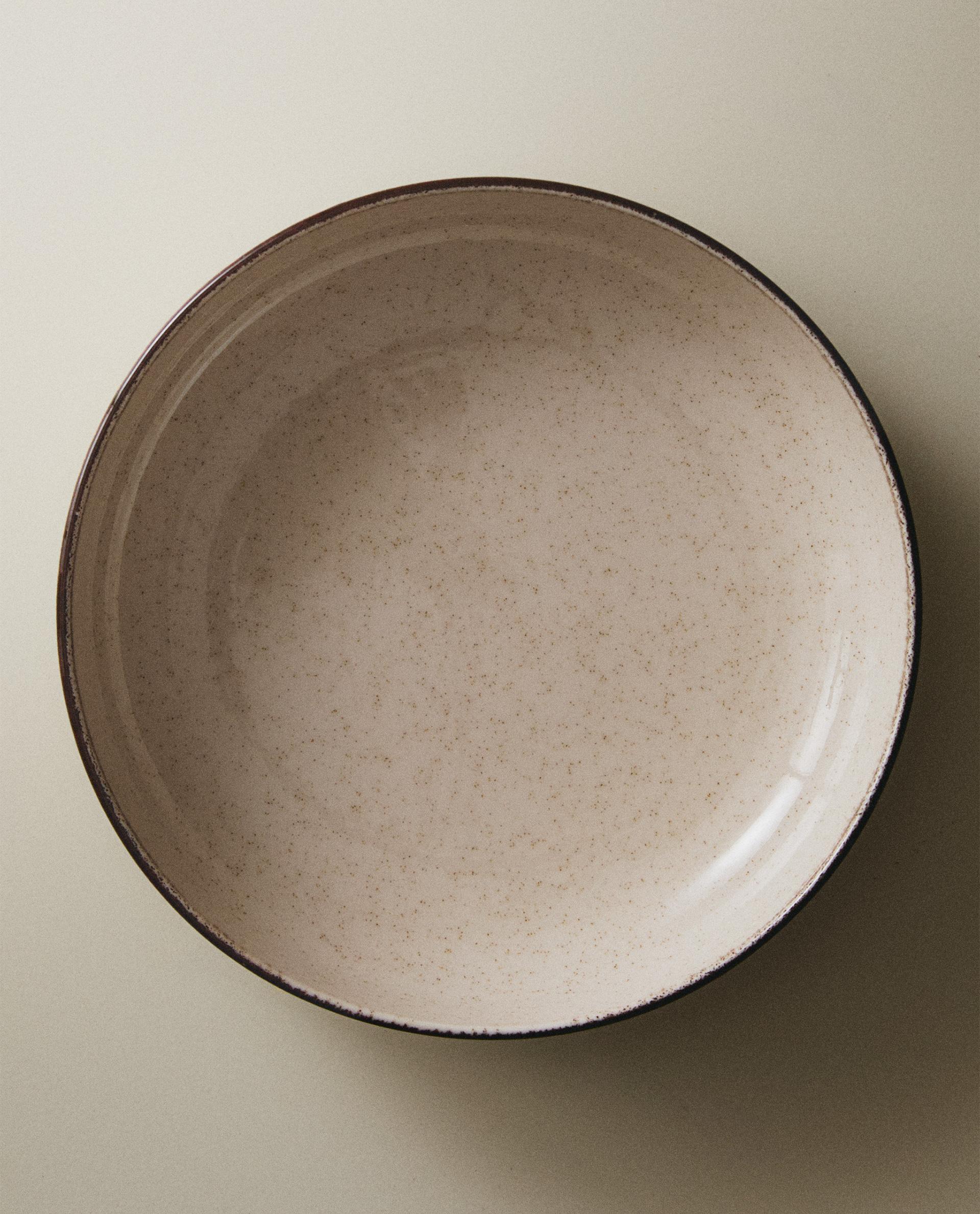 PORCELAIN SOUP PLATE WITH ANTIQUE FINISH RIM