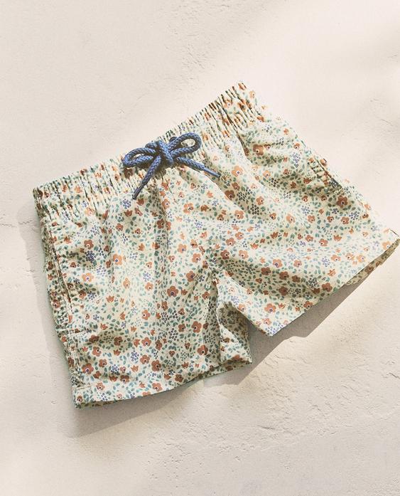 KIDS’ FLORAL SWIMMING TRUNKS