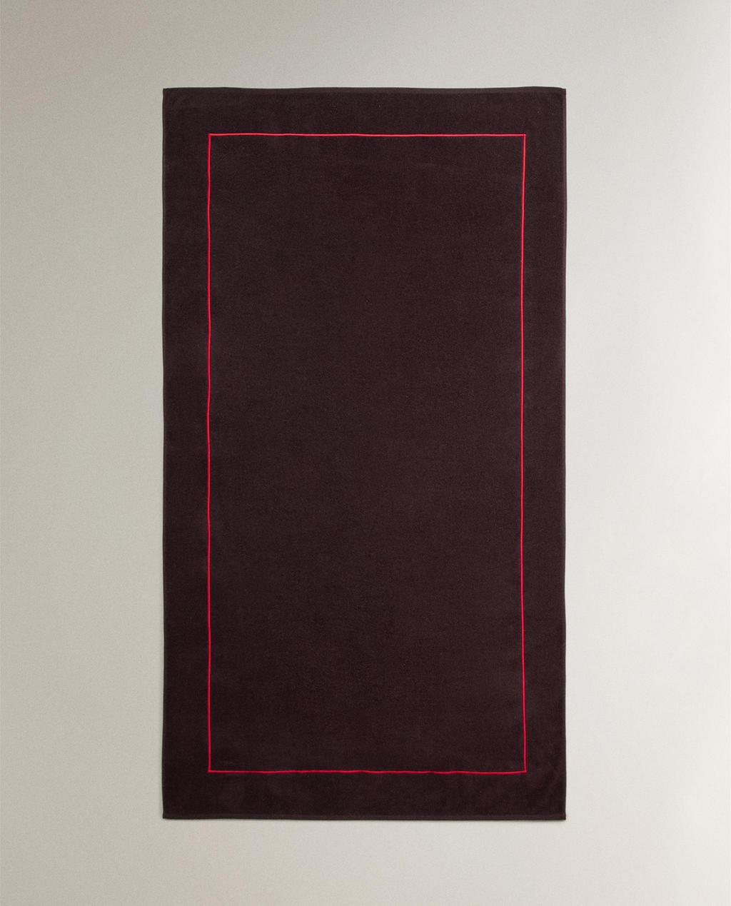 منشفة شاطئ بإطار سادة