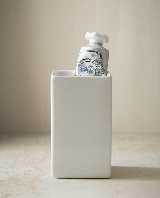 VALKOINEN KERAAMINEN HAMMASHARJATELINE