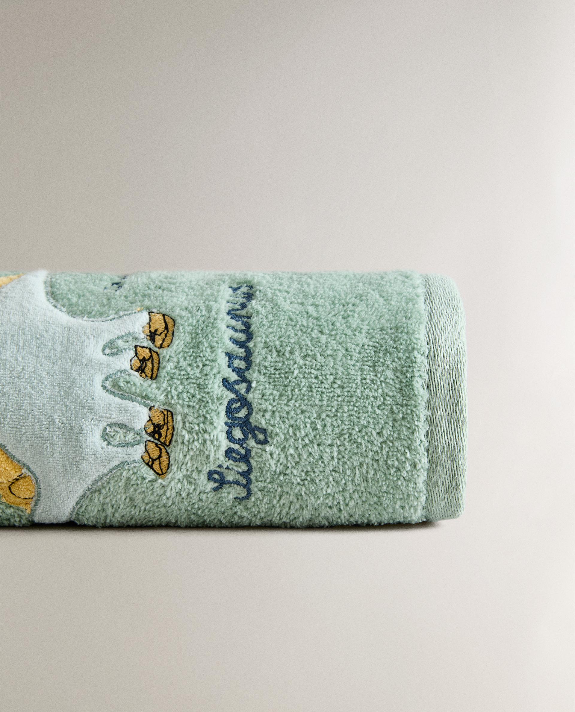 CHILDREN’S VELOUR DINOSAUR BATH TOWEL