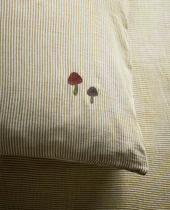 غلاف مخدة موسلين مخطط للأطفال غلاف مخدة موسلين مخطط للأطفال