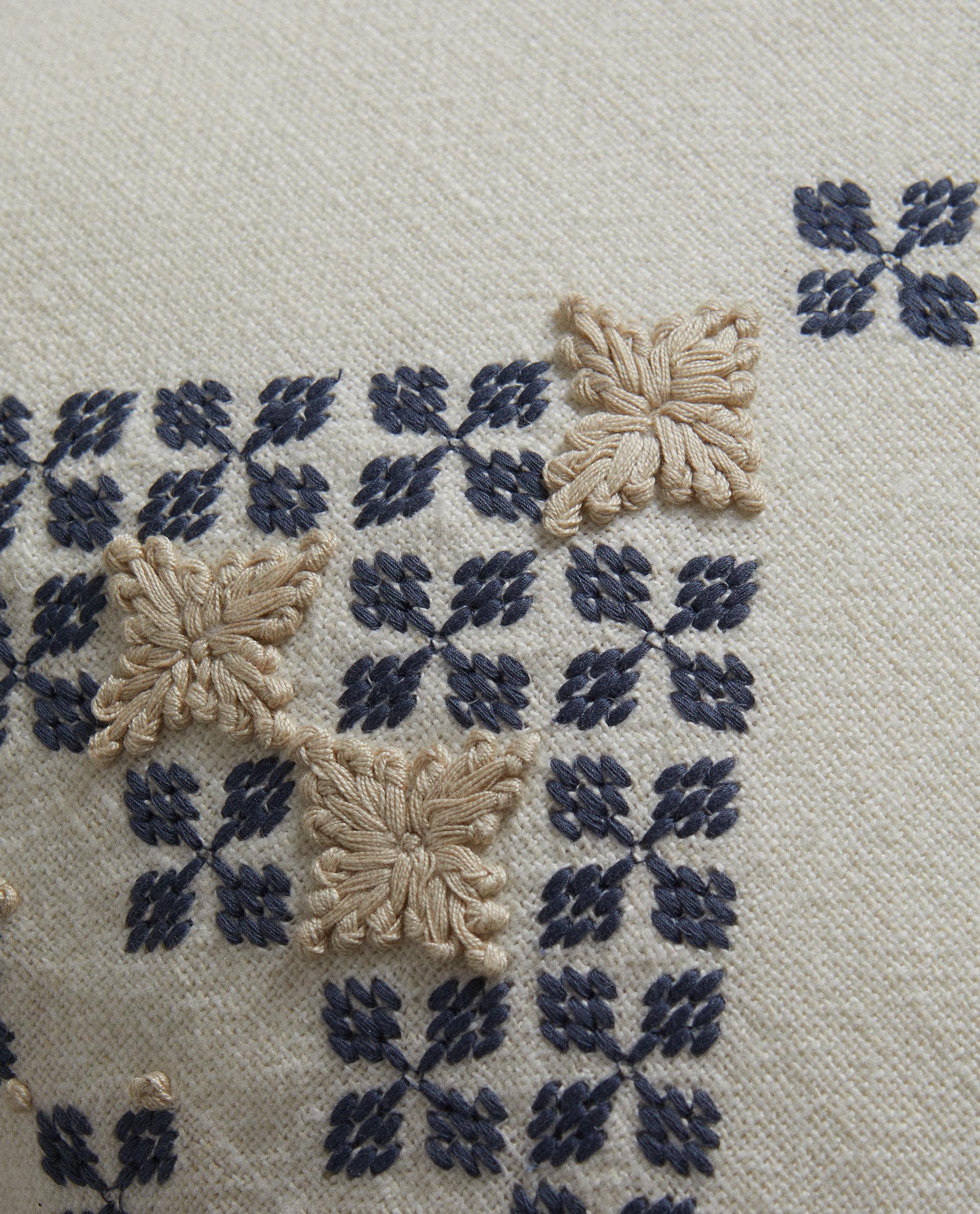 EMBROIDERED CUSHION COVER