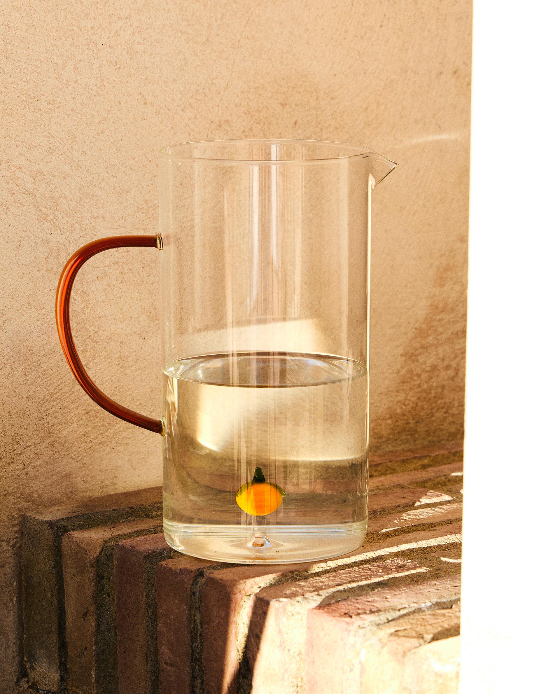 ORANGE GLASS JUG WITH HANDLE