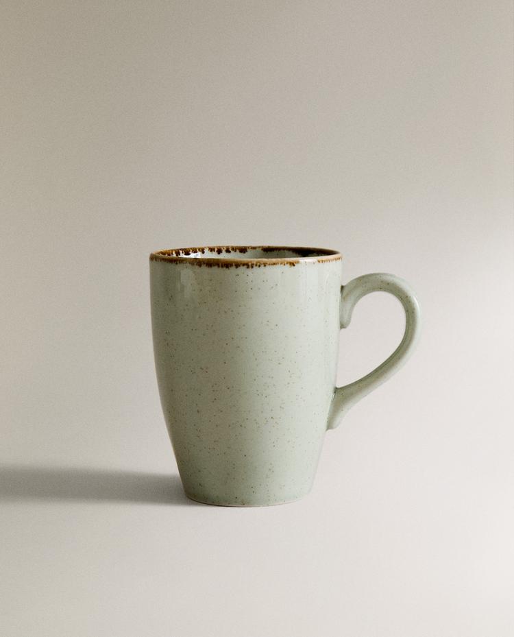PORCELAIN MUG WITH ANTIQUE FINISH RIM
