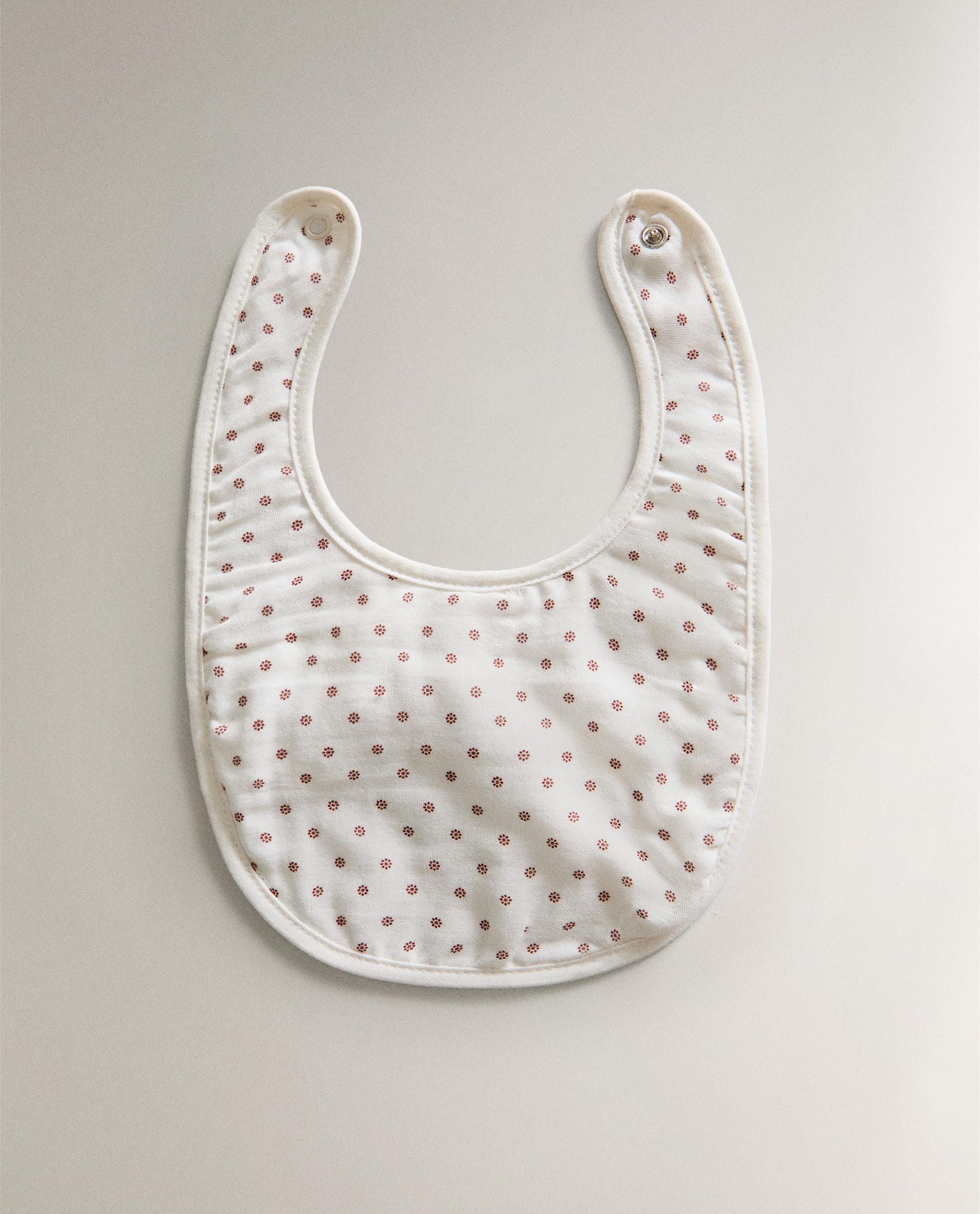 CHILDREN'S BIB WITH MINI FLORAL DESIGN