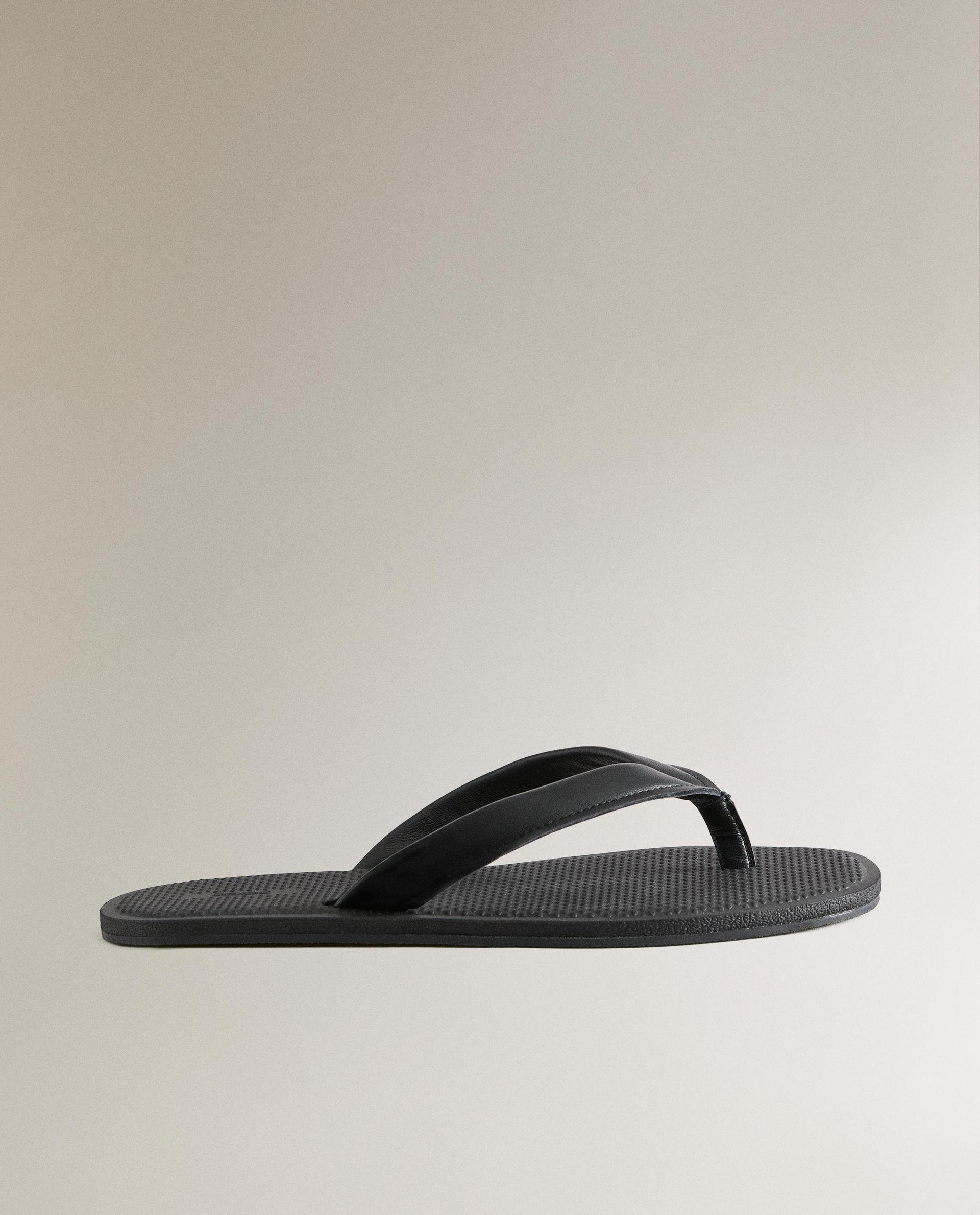 STRAPPY LEATHER TOE DIVIDER SANDALS STRAPPY LEATHER TOE DIVIDER SANDALS