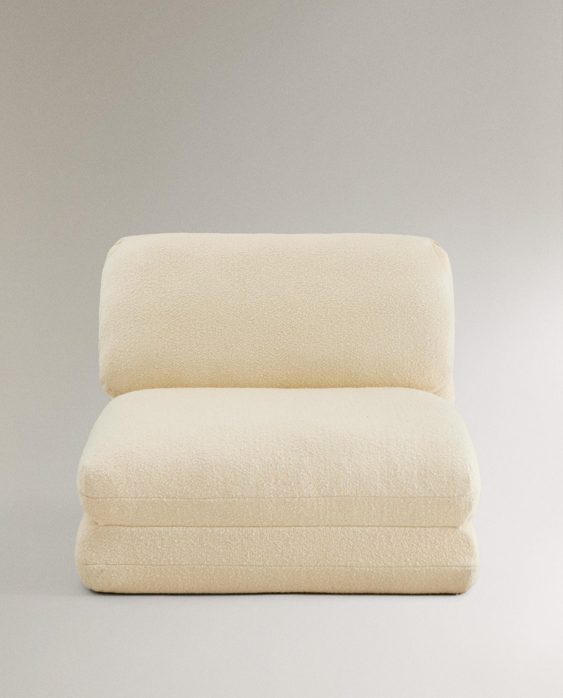 FOLDING BOUCLÉ ARMCHAIR