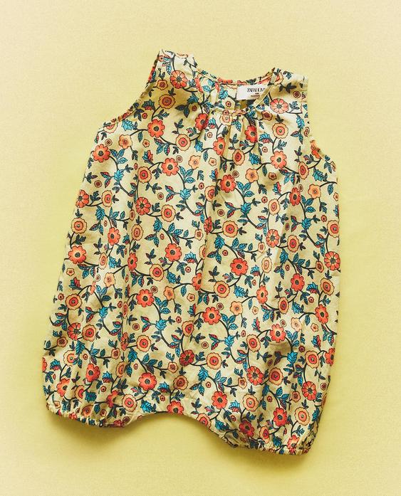 BABYKRUIPPAKJE MET BLOEMENPRINT