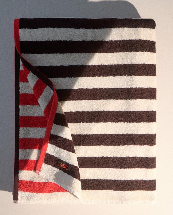 منشفة شاطئ مخططة بوجهين