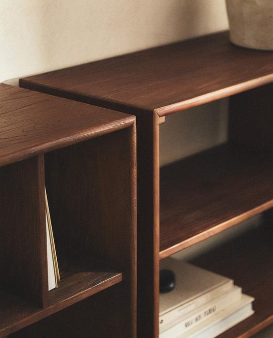 LOW BOOKCASE WITH IRREGULAR SHELVES