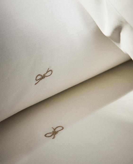 غلاف لحاف من القطن الساتان بفيونكات (كثافة 300 خيط) غلاف لحاف من القطن الساتان بفيونكات (كثافة 300 خيط)