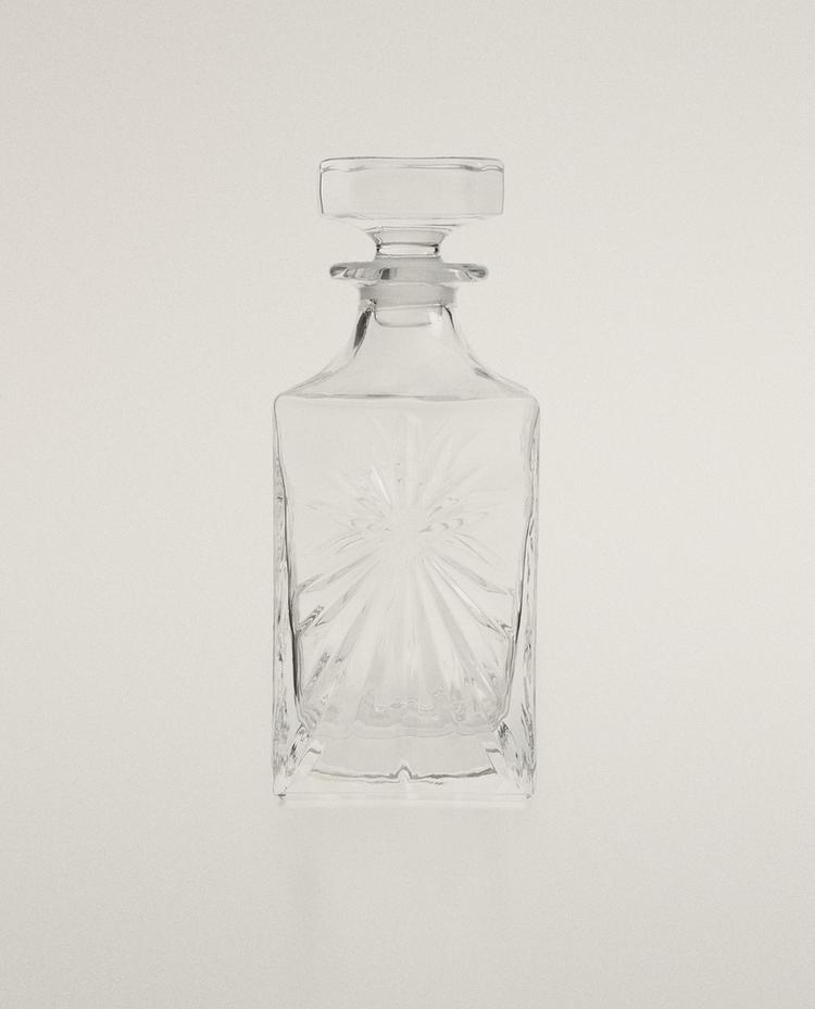CRYSTALLINE BOTTLE WITH RAISED DESIGN